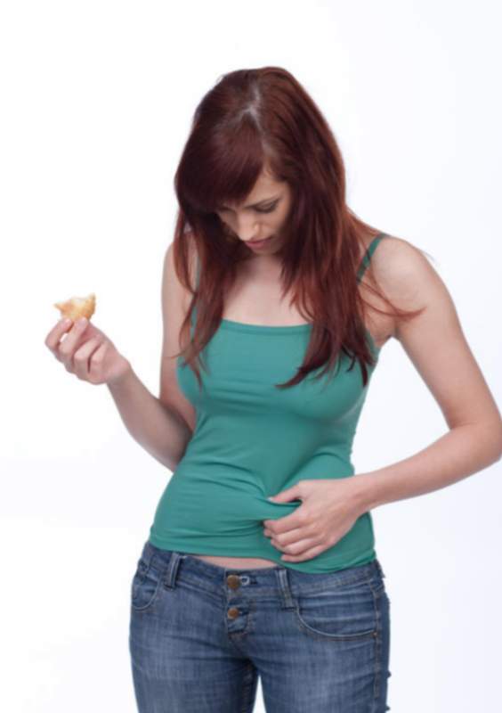 causas de grasa en el estómago